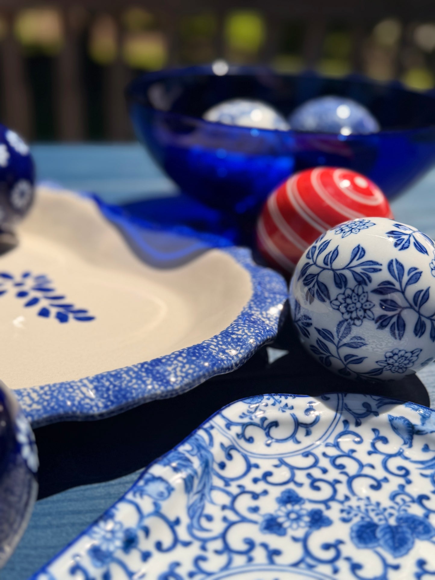 Curated Set of 8 Ceramic Carpet Balls & Cobalt Glass Presentation Bowl