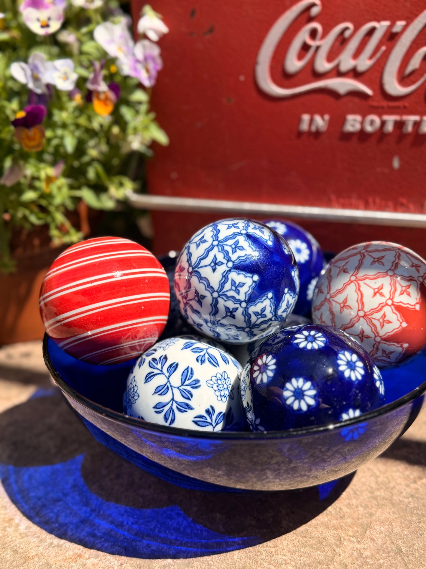 Curated Set of 8 Ceramic Carpet Balls & Cobalt Glass Presentation Bowl