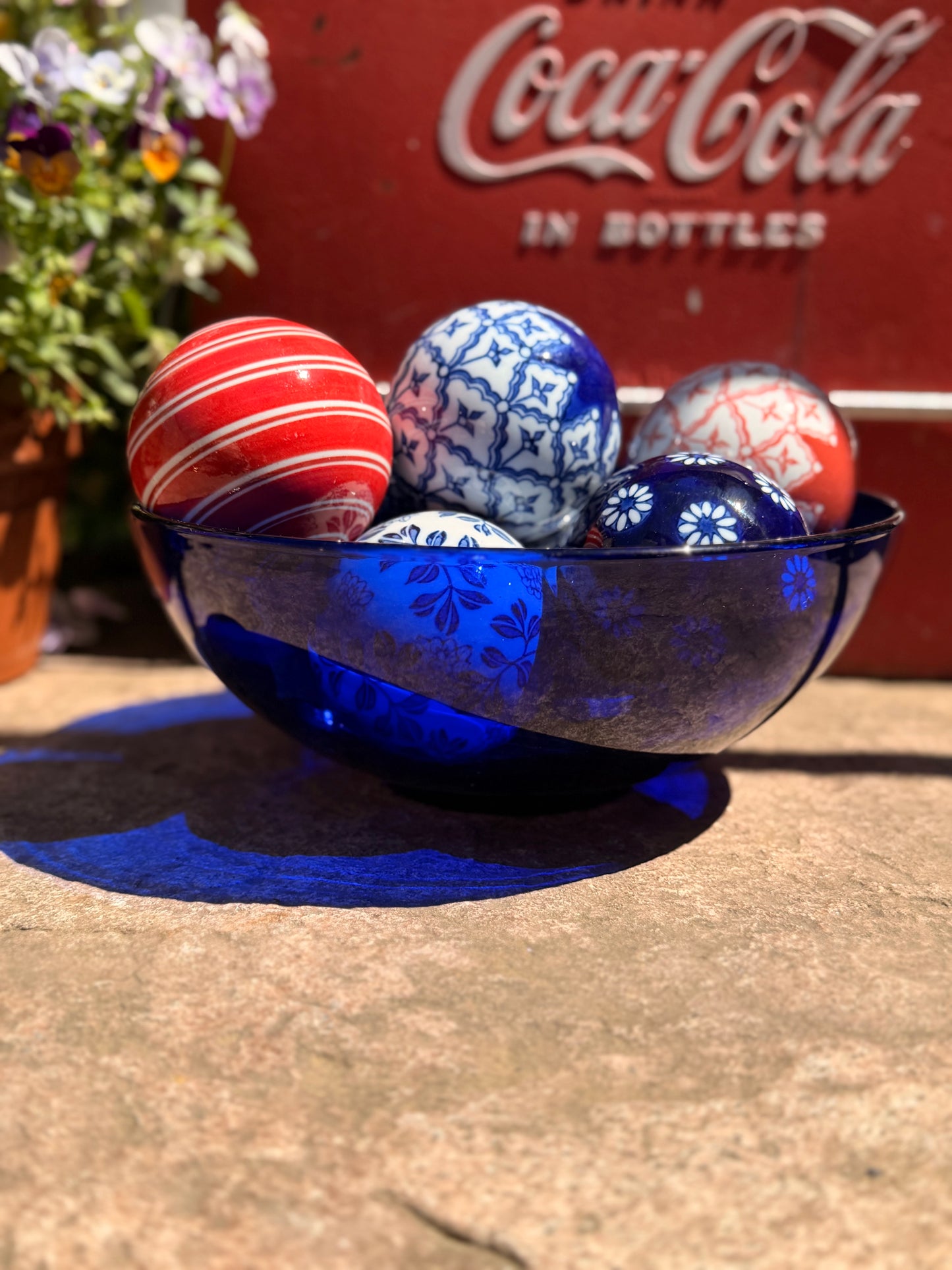 Curated Set of 8 Ceramic Carpet Balls & Cobalt Glass Presentation Bowl